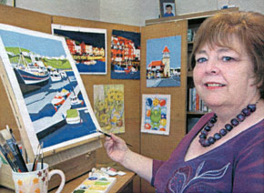 photograph of marilyn spence with her paintings